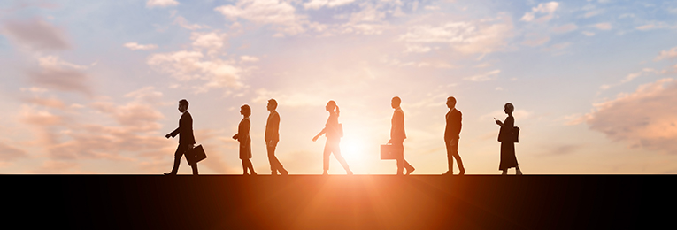 a group of people with different profiles seen walking together on one side